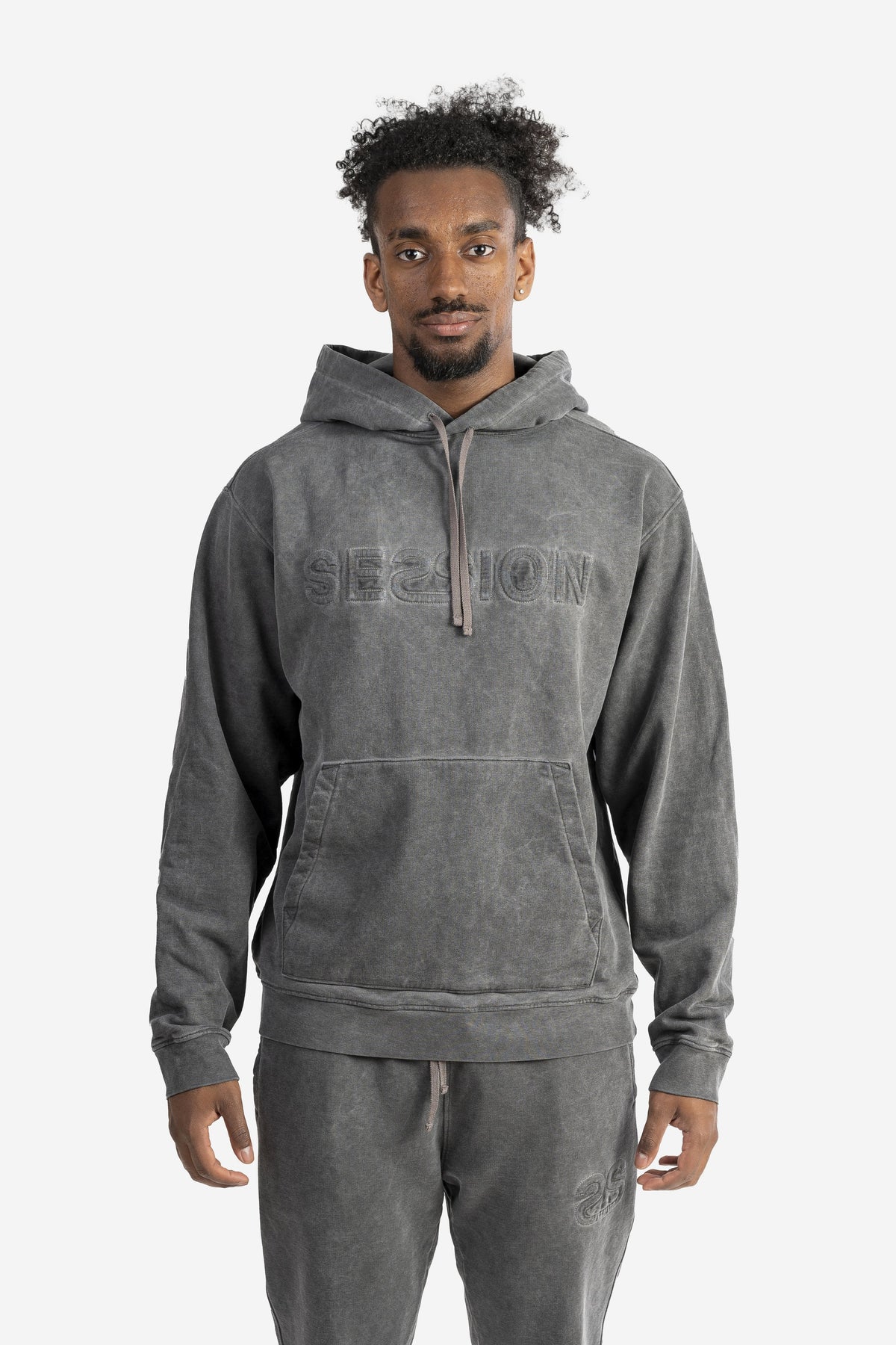 Felpa marmorizzata over size con logo embossed