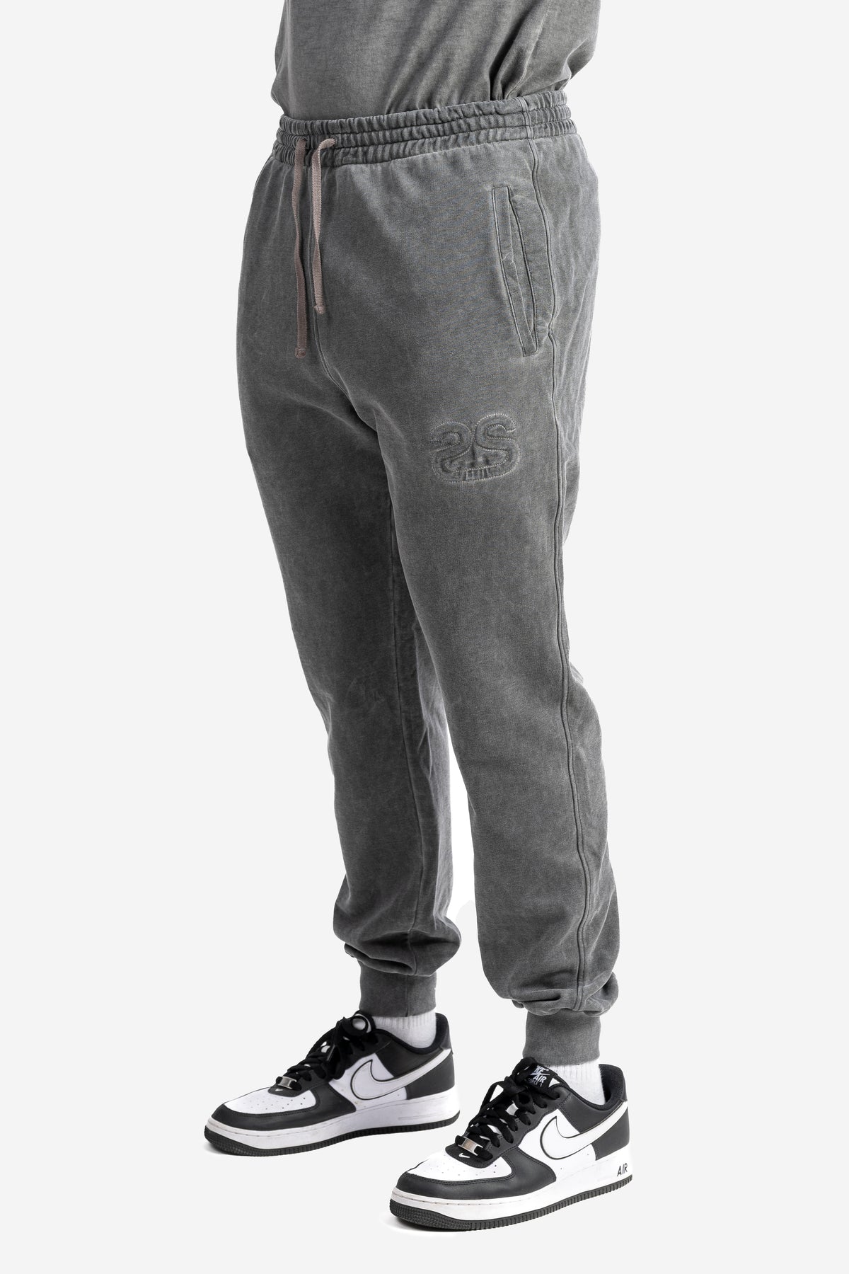 Pantalone marmorizzato con logo embossed