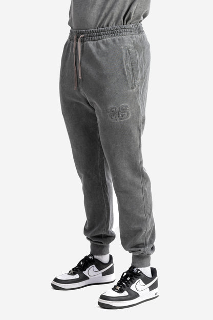 Pantalone marmorizzato con logo embossed